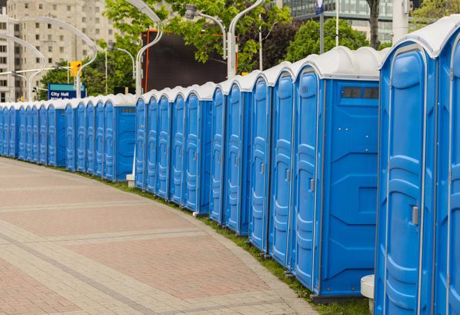 a row of portable restrooms set up for a special event, providing guests with a comfortable and sanitary option in Mission Viejo